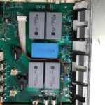 Sửa Bếp Từ Đường Hoàng Quốc Việt Cầu Giấy Hà Nội Mặt sau board nguồn bếp từ với các linh kiện công suất